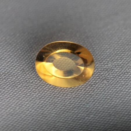 Madeira Citrine, 8x6mm concentric round cut, front view.