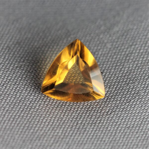 Madeira Citrine, 7mm concentric trillion cut, front view.