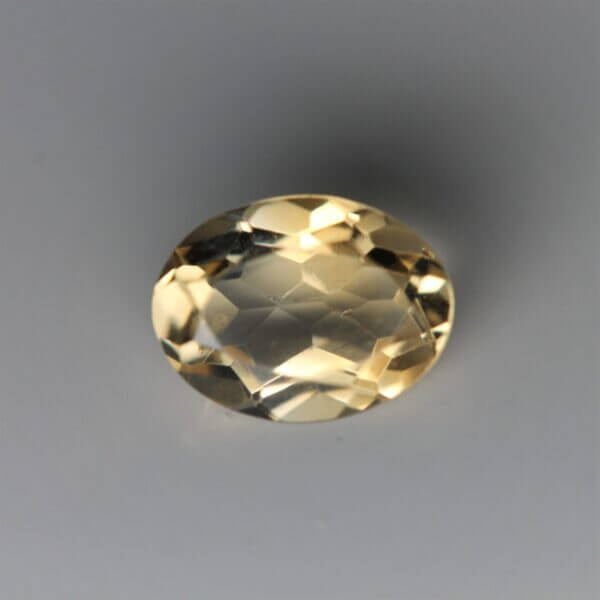 Citrine, 8x6mm oval cut, front view.