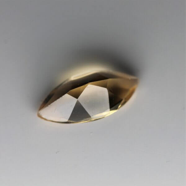 Citrine, 12x6mm marquise cut, back view.