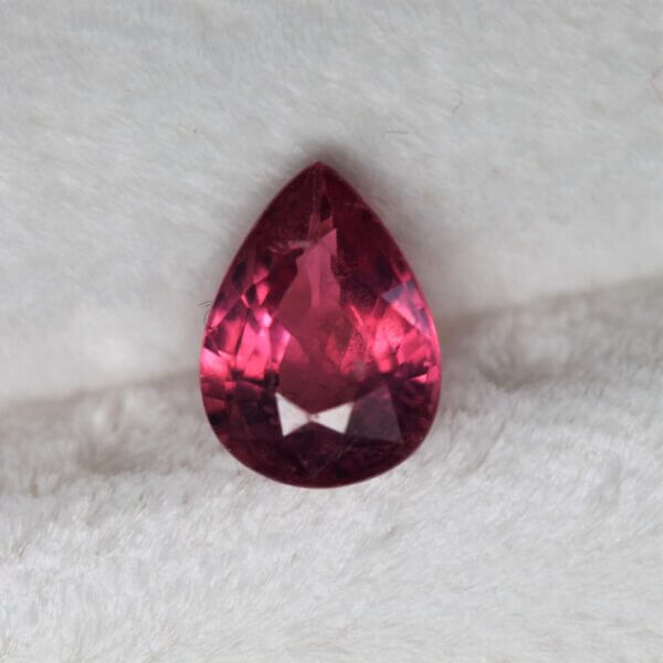 Mahenge Spinel, 8x6mm pear cut, front view.