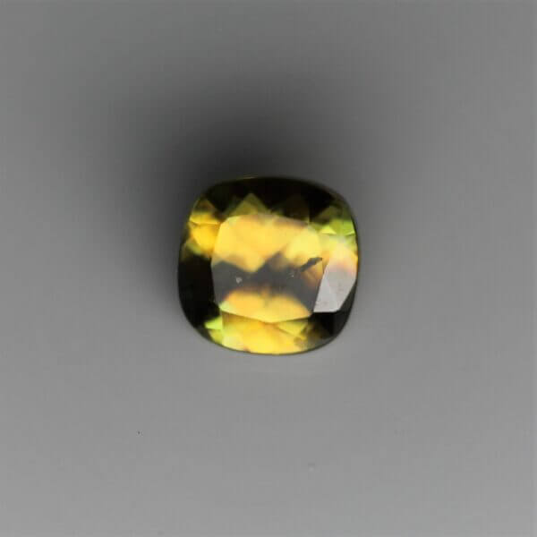 Sphene, 4mm cushion cut, front view.