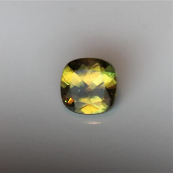 Sphene, 4mm cushion cut, front view.